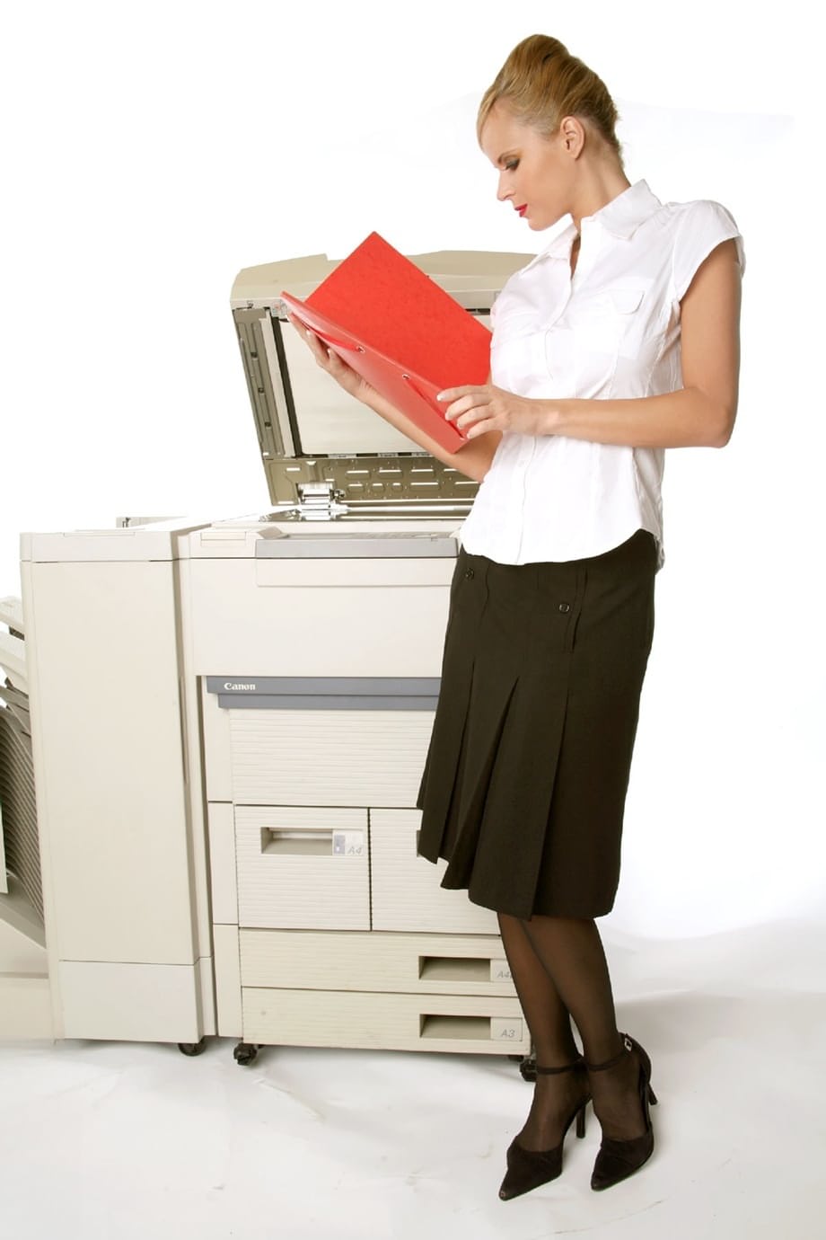 Sizzling hot busty secretary Zuzana works the copy machine in black stockings