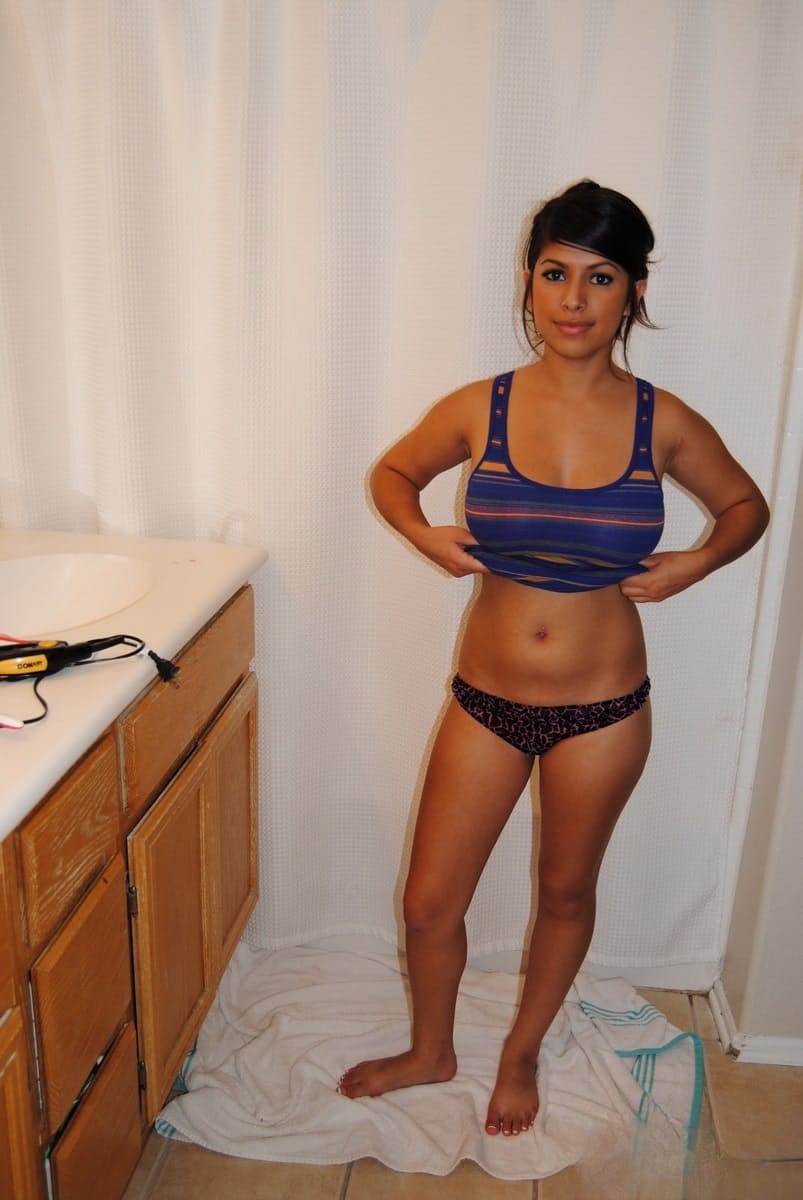Cute brunette Layla Rose strips to reveal big tits & firm ass in the bathroom