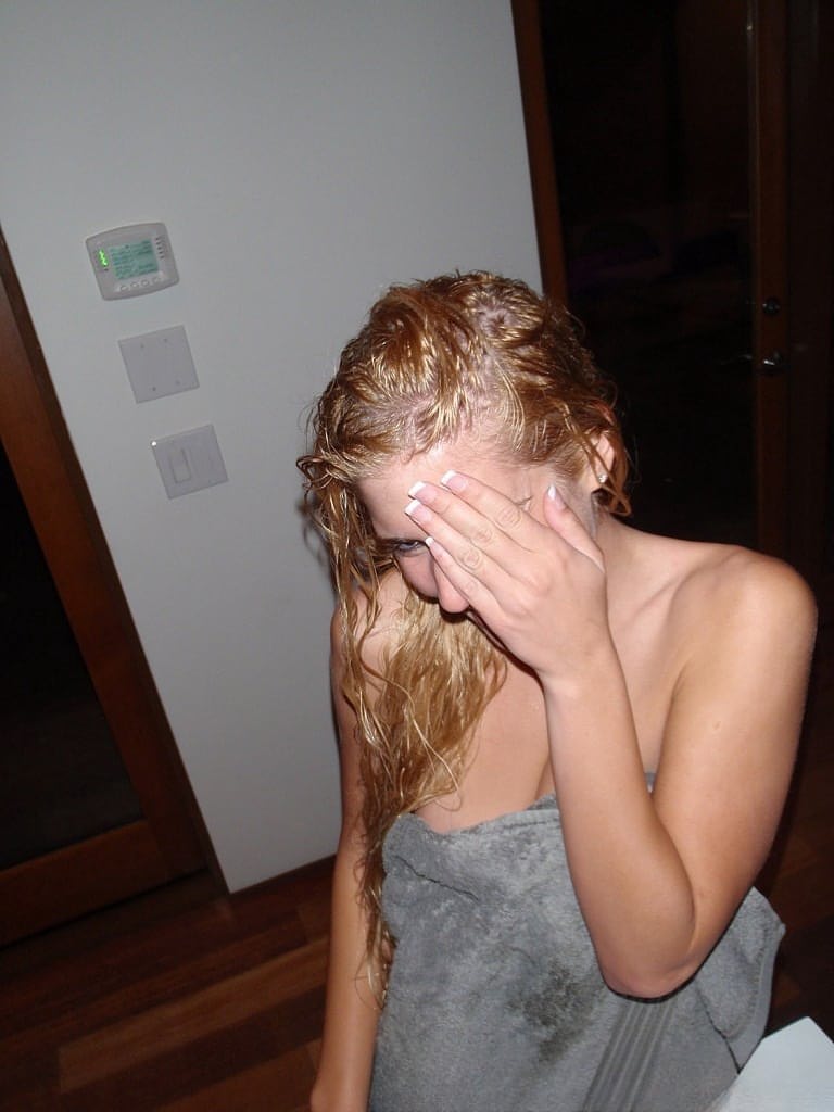 Young blonde girl takes nude and semi-nude selfies during solo action