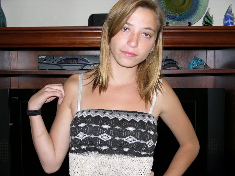 Young looking first timer Alice W proudly shows her butthole and bald pussy
