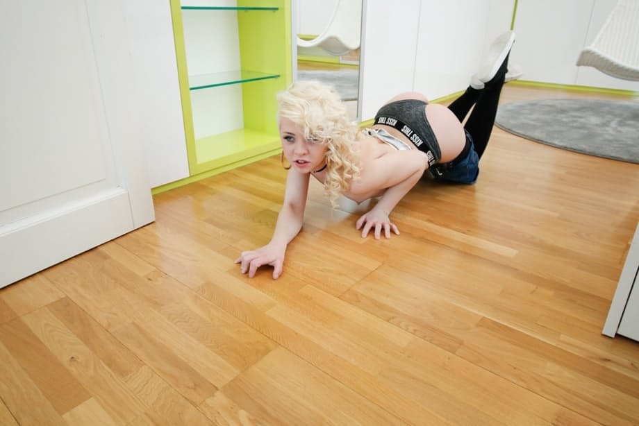 Cute blonde girl Anna Rey shows her pussy in over the knee socks