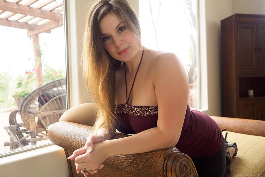 Big tit Danielle tries out some new sex toys on the sofa