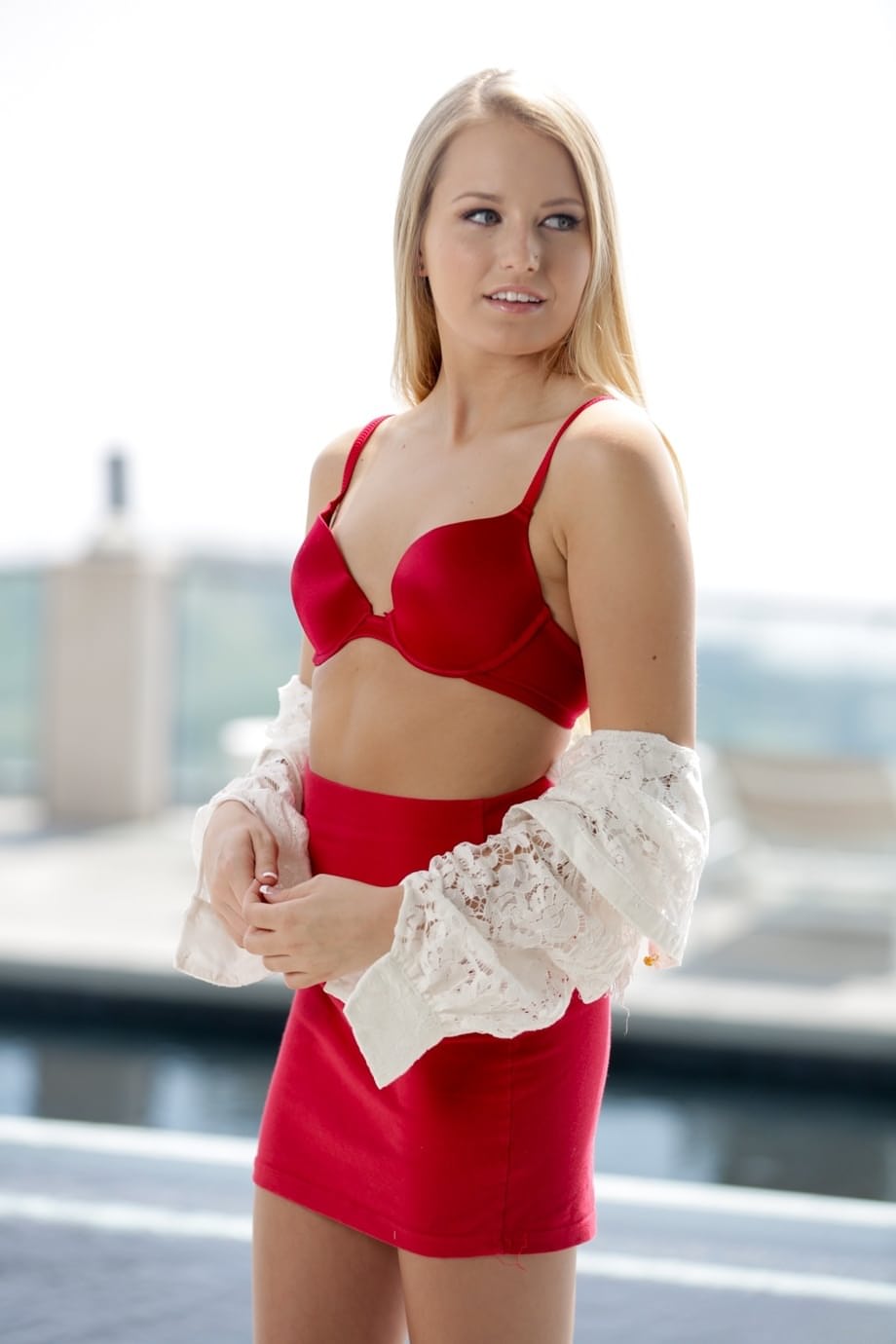 Exotic blonde pornstar Alexa Grace strips at the top of the building