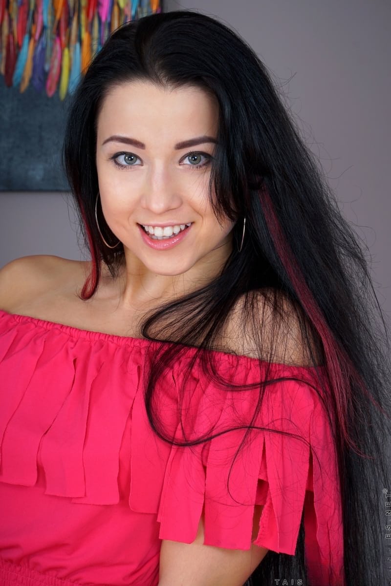 Dark haired cutie Taissia Shanti shows perky breasts spreading pussy lips wide