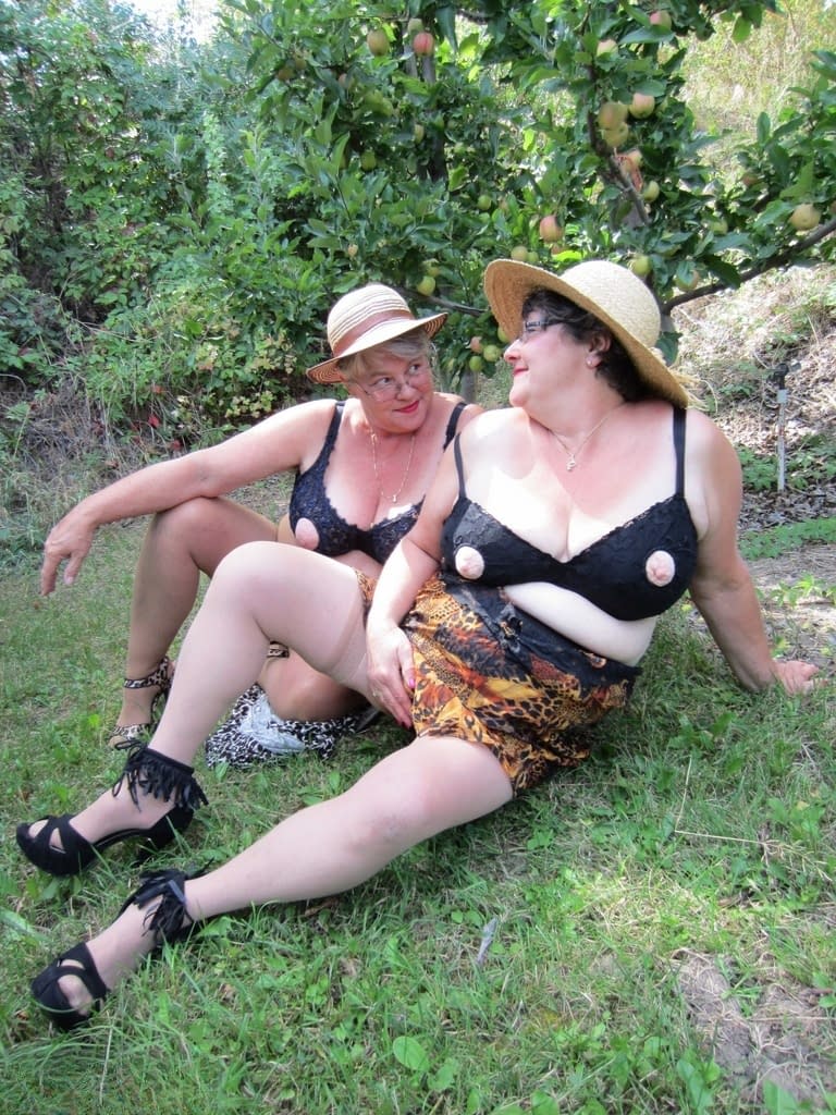 Older granny Girdle Goddess & her aged gal pal showing ass & nipples outdoors