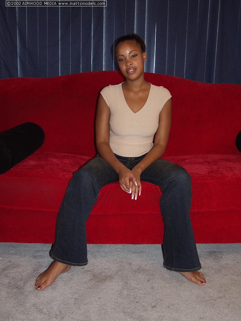 Black girl Candice showcases her pussy after getting totally naked on couch