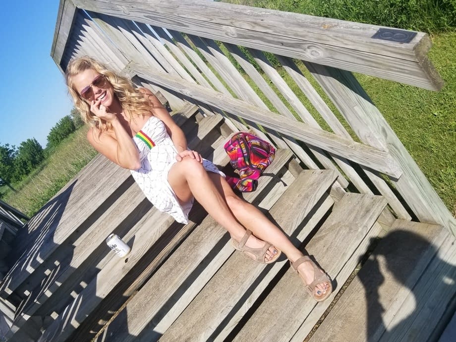 Sexy blonde with sunglasses Meet Madden sunbathing topless in the nature