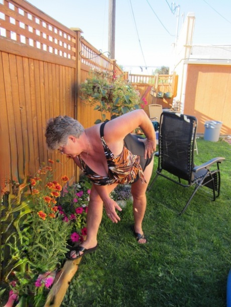 Fatty mature granny Girdle Goddess peels to enjoy wading pool skinny dip