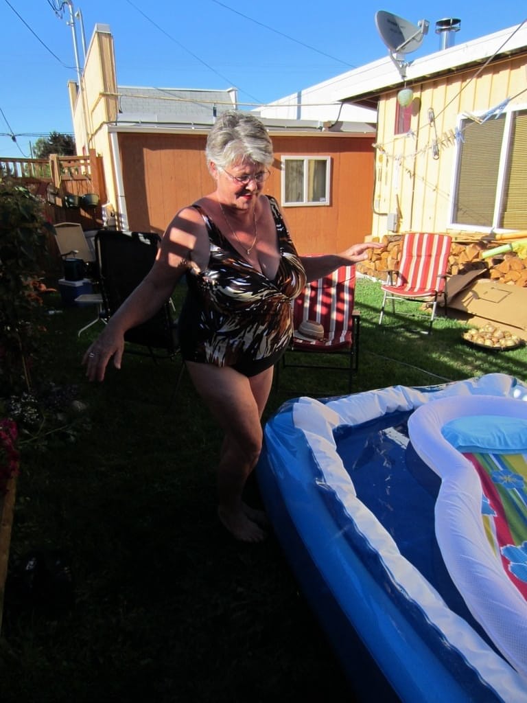 Fatty mature granny Girdle Goddess peels to enjoy wading pool skinny dip