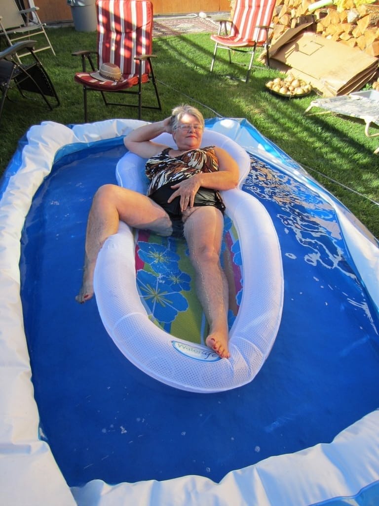 Fatty mature granny Girdle Goddess peels to enjoy wading pool skinny dip