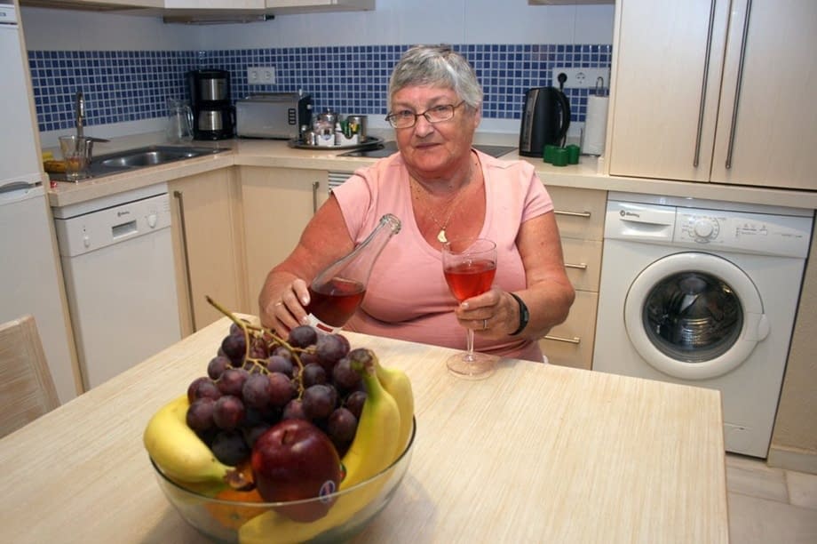 Mature BBW Grandma Libby strips in the kitchen to wine & dine & toy pussy nude