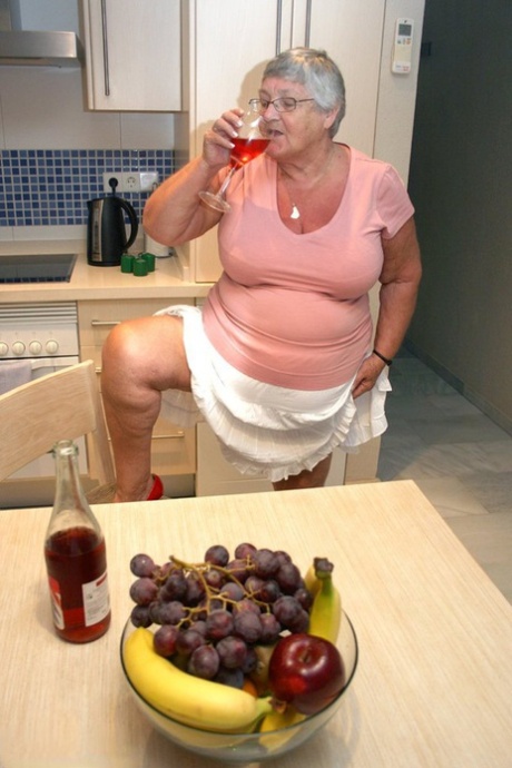 Mature BBW Grandma Libby strips in the kitchen to wine & dine & toy pussy nude
