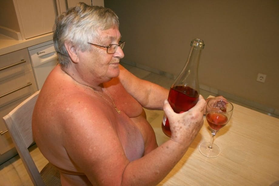 Mature BBW Grandma Libby strips in the kitchen to wine & dine & toy pussy nude