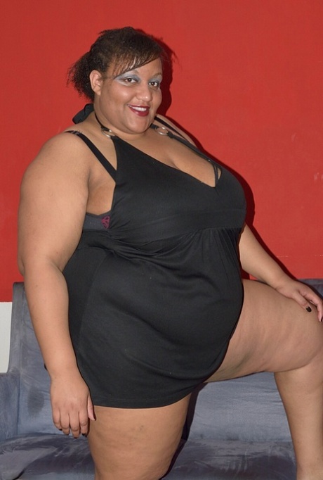 Ebony SSBBW CurvyBunnyB sets loose mega big tits and reveals her massive ass