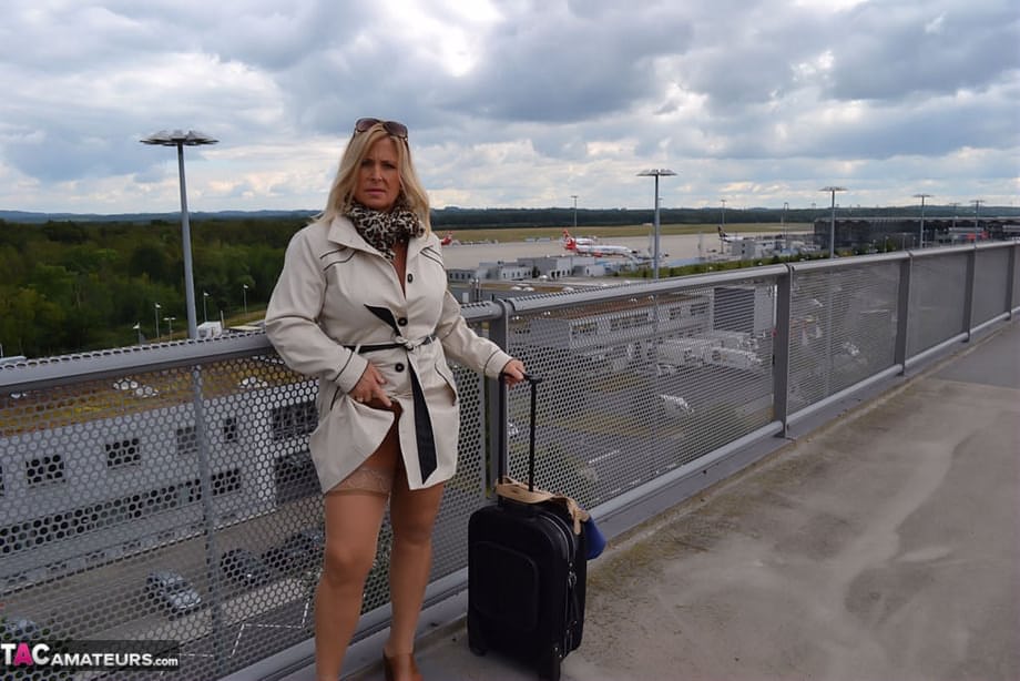 Kinky big tit mature exhibitionist wears nothing underneath coat in public