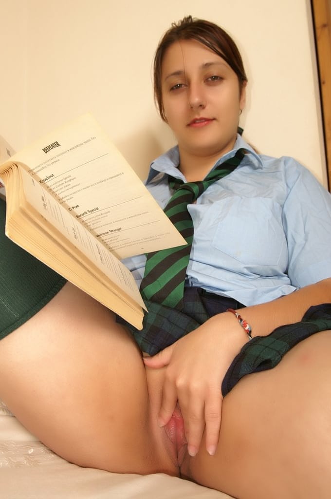 Naughty schoolgirl Kimberly Scott reading smut & masturbating her teen pussy