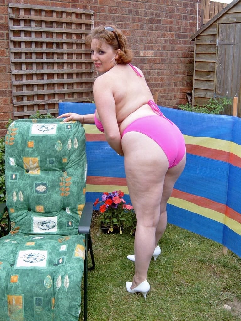 Brazen mature fatty Curvy Claire sheds bikini in the backyard to finger fuck