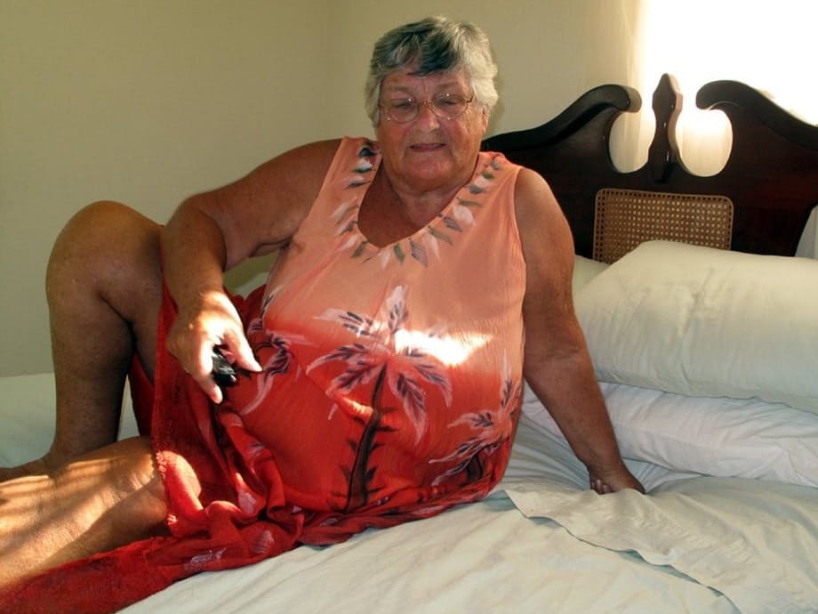 Fat old Grandma Libby licking her big nipples while spreading nude for closeup