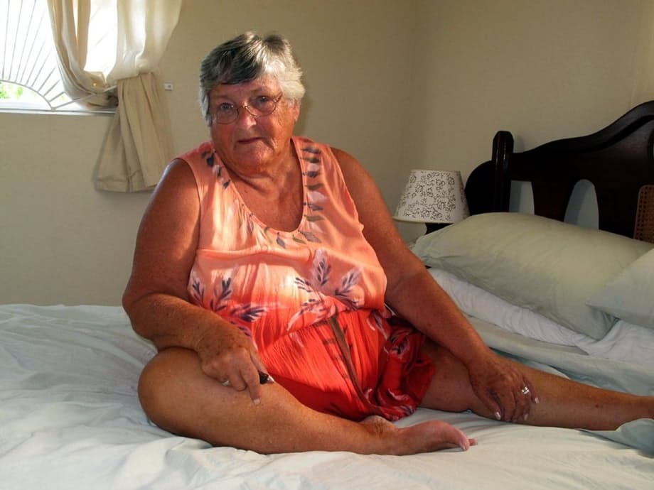 Fat old Grandma Libby licking her big nipples while spreading nude for closeup