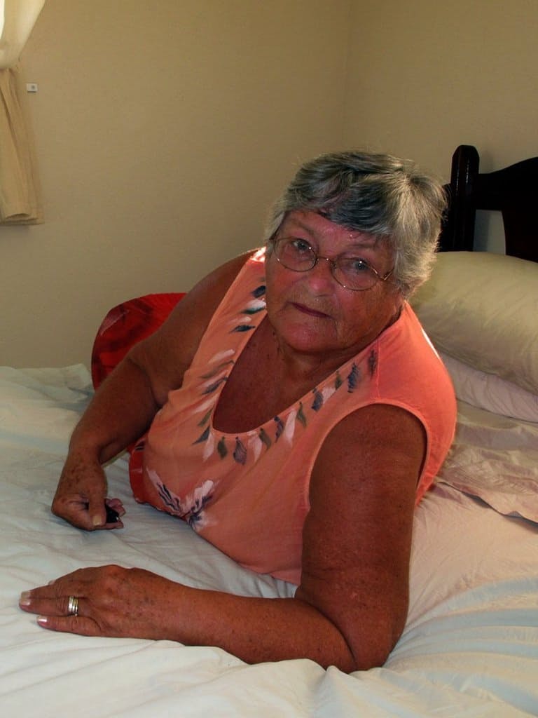 Fat old Grandma Libby licking her big nipples while spreading nude for closeup