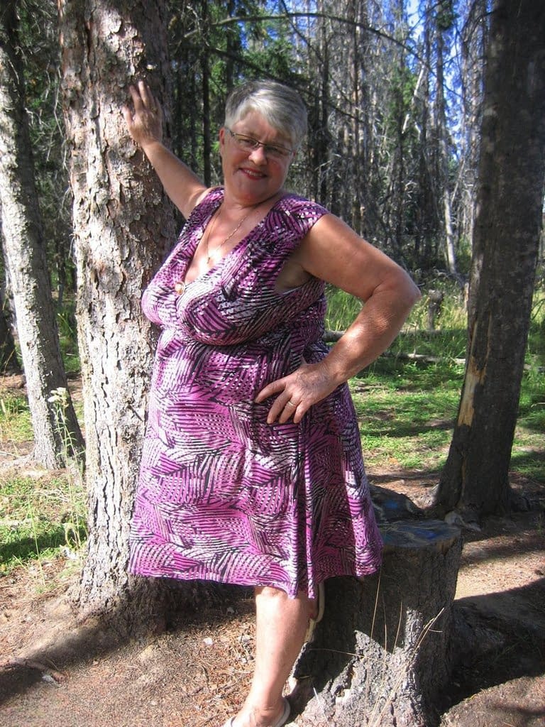 Fat granny Girdle Goddess loses her purple outfit in the woods and poses nude