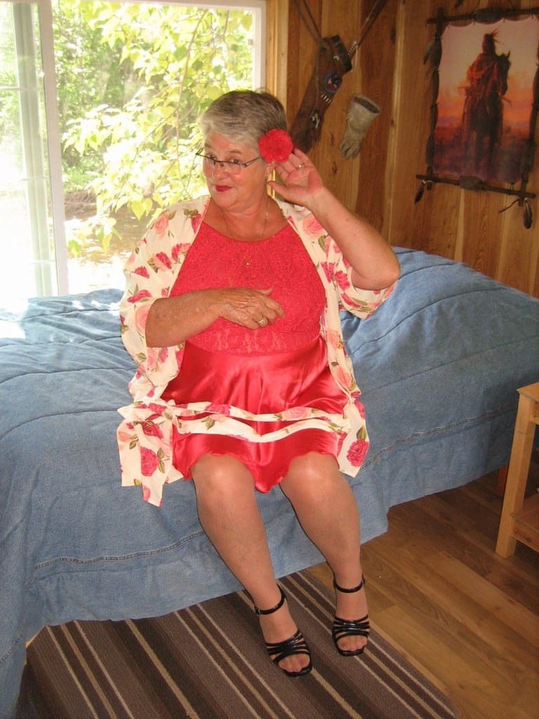 Short haired granny Girdle Goddess stripping to her stockings and high heels