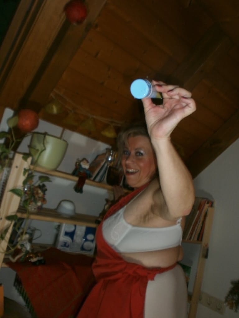 Horny oma Caro pleasures her pussy with a wooden spoon and a cucumber