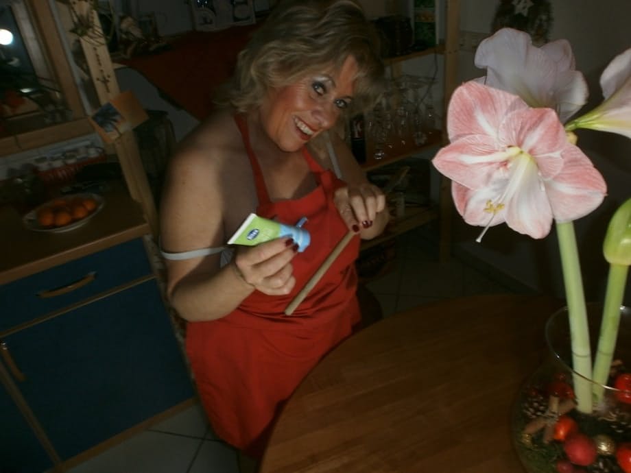 Horny oma Caro pleasures her pussy with a wooden spoon and a cucumber