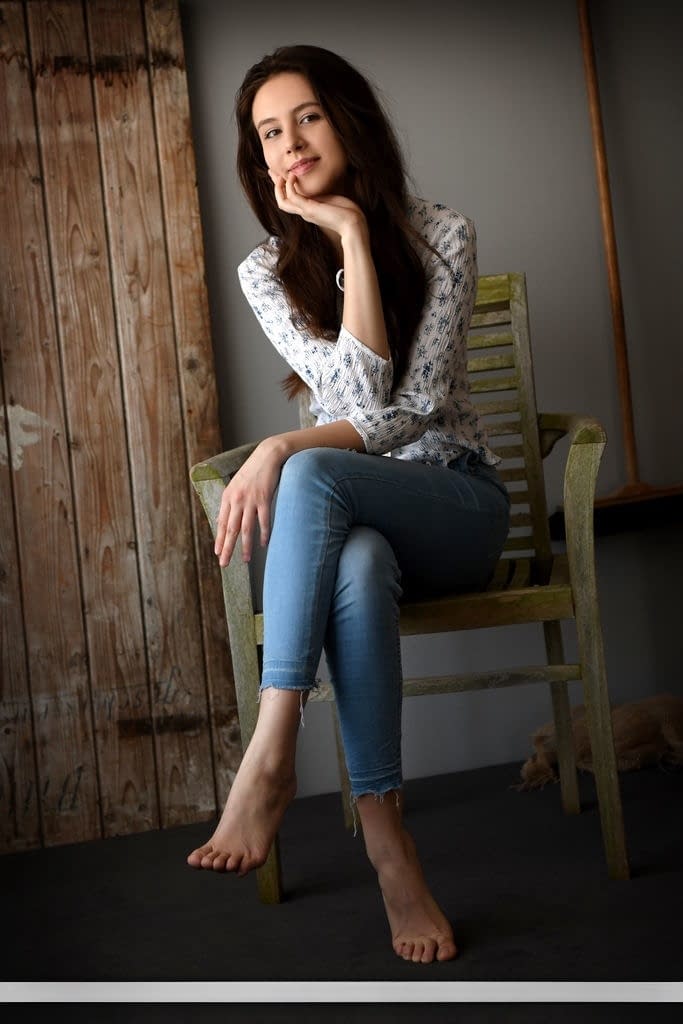 Sweet brunette teen Alisa Amore removes blue jeans on way to modeling naked