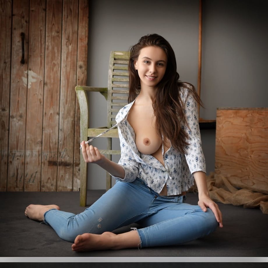 Sweet brunette teen Alisa Amore removes blue jeans on way to modeling naked