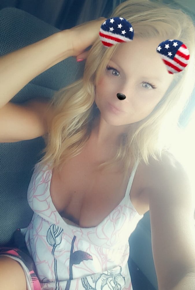 Blonde MILF Madden shops her topless selfie with silly ears and nose