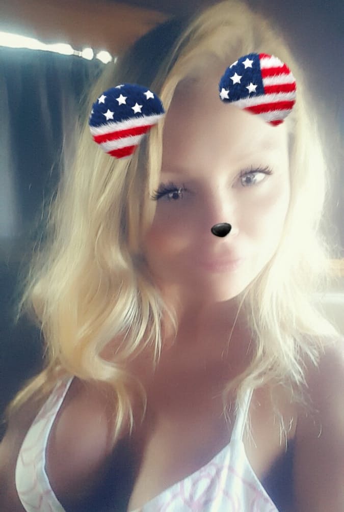 Blonde MILF Madden shops her topless selfie with silly ears and nose