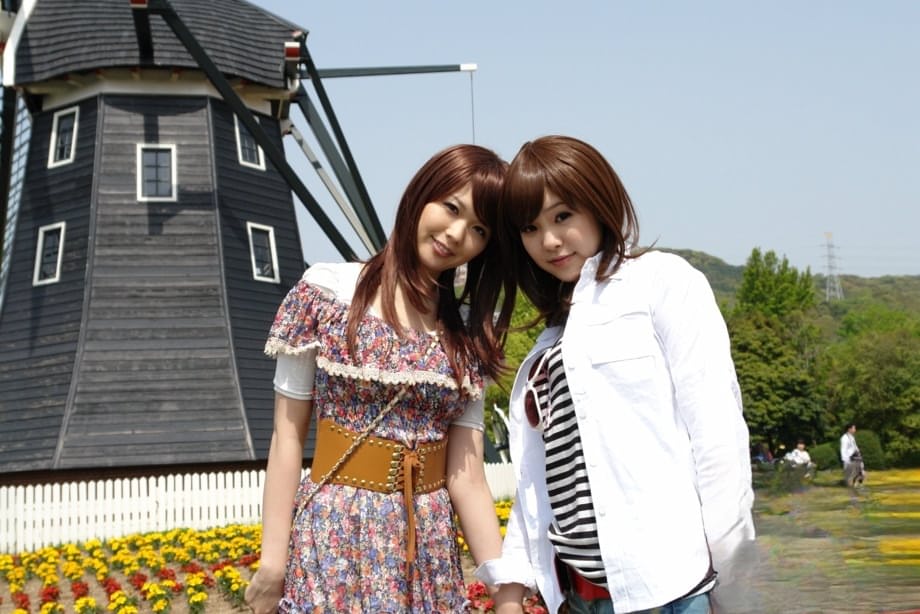 Japanese lesbians Rimu Endo & Ueno Misaki show bare legs while taking a stroll