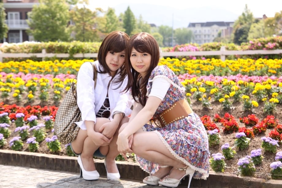 Japanese lesbians Rimu Endo & Ueno Misaki show bare legs while taking a stroll