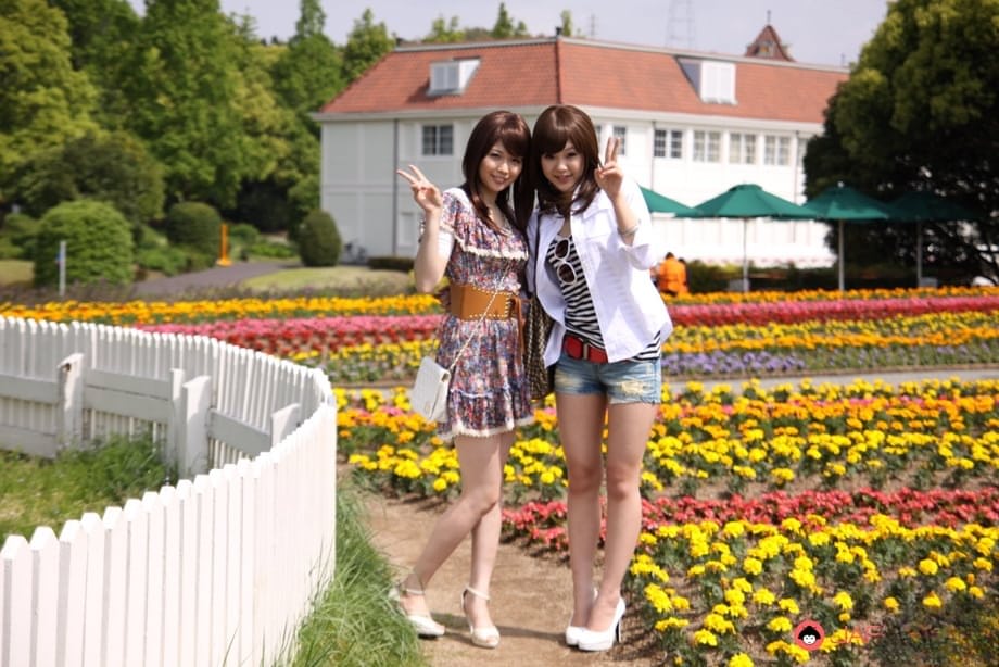 Japanese lesbians Rimu Endo & Ueno Misaki show bare legs while taking a stroll