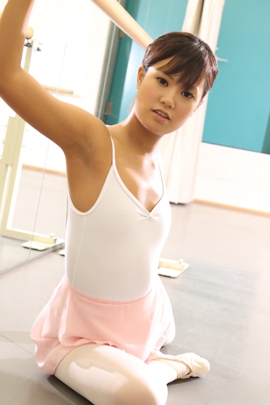 Japanese ballerina Ruri Kinoshita stretches her young body in tights & tutu