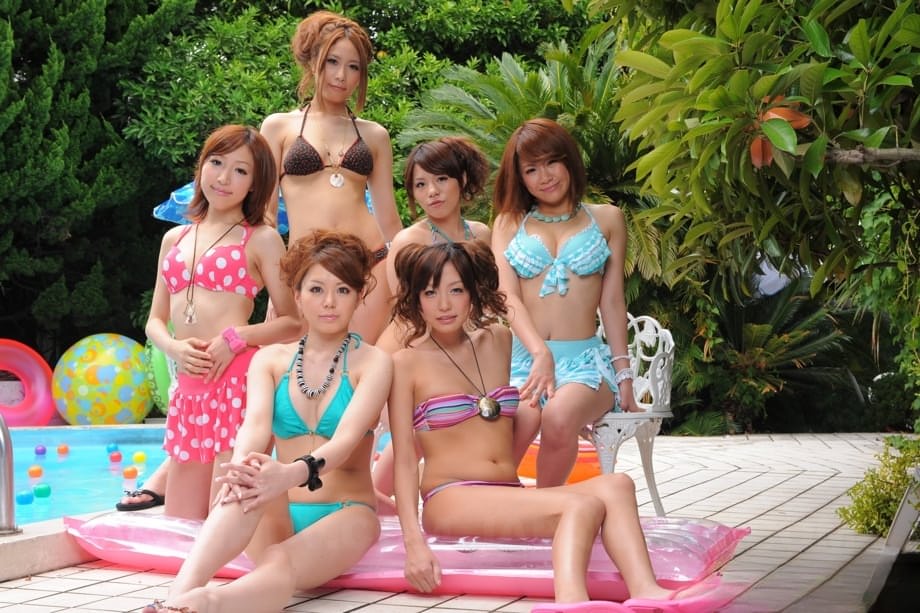Sweet Japanese girlfriends in sexy swimsuits flaunt their beauty poolside
