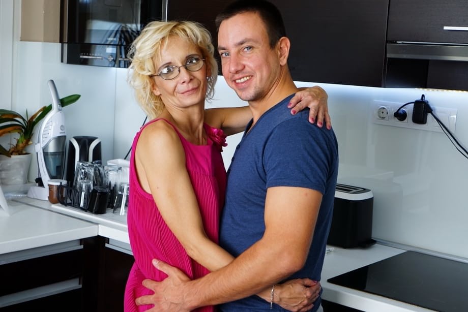 Thin housewife of advancing years gets banged by her toy boy in the kitchen
