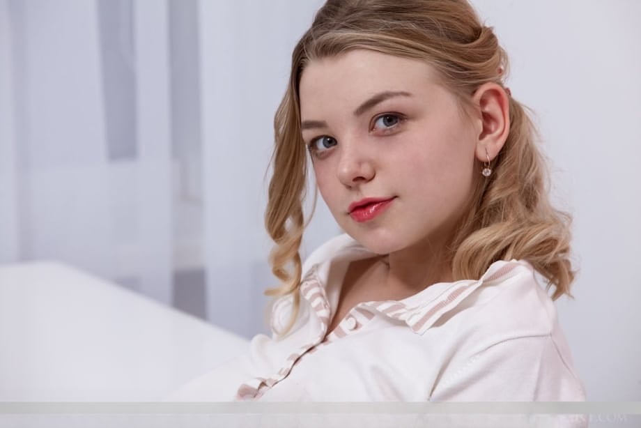 Charming teen Daniel Sea puts her great tits on display after slowly disrobing