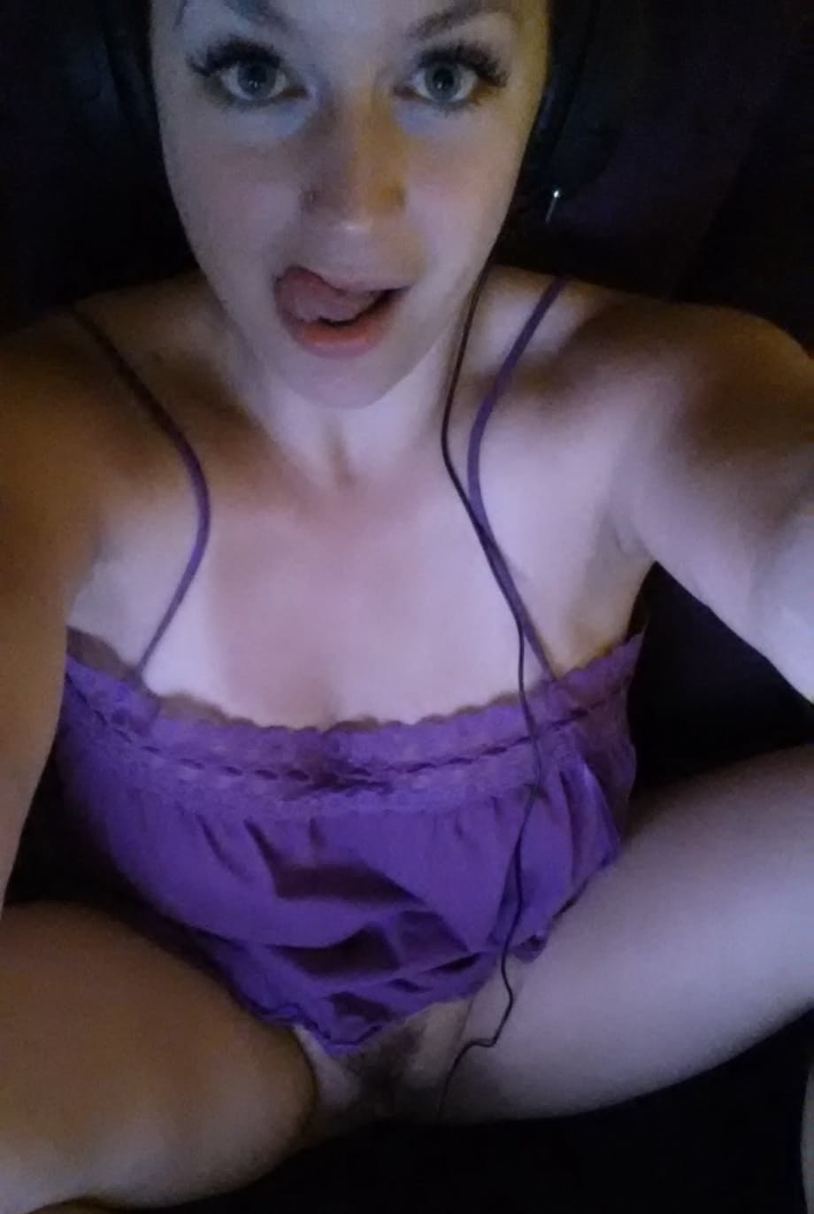 Big titted amateur takes nude and semi-nude selfies around her house