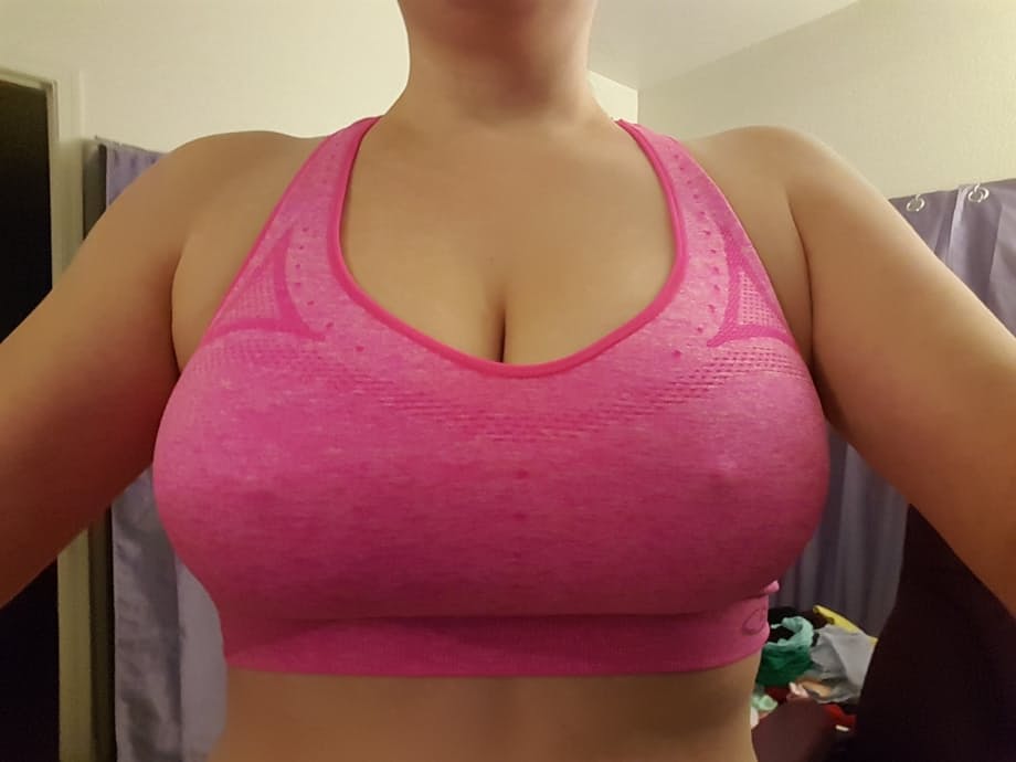 Big titted amateur takes nude and semi-nude selfies around her house