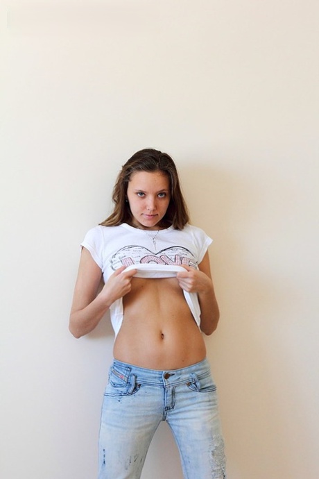 Amateur model Katya shows off her damp pussy during close up action