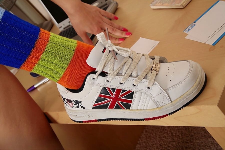 Solo girl Dasha gets naked in multi-colored knee socks and sneakers