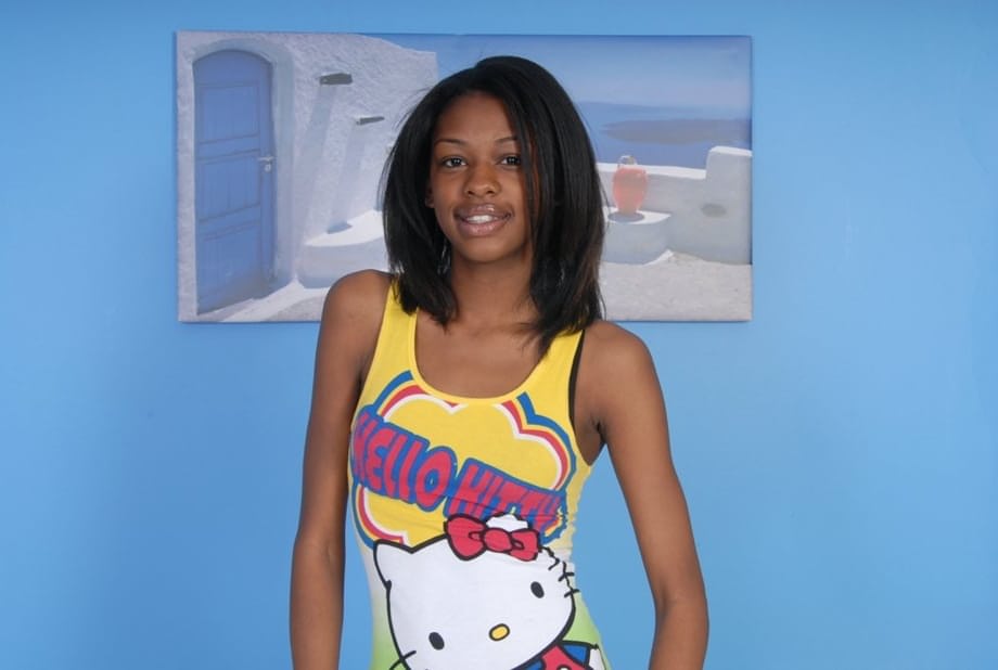 Petite ebony girl parts her hairy pussy after taking off her clothes