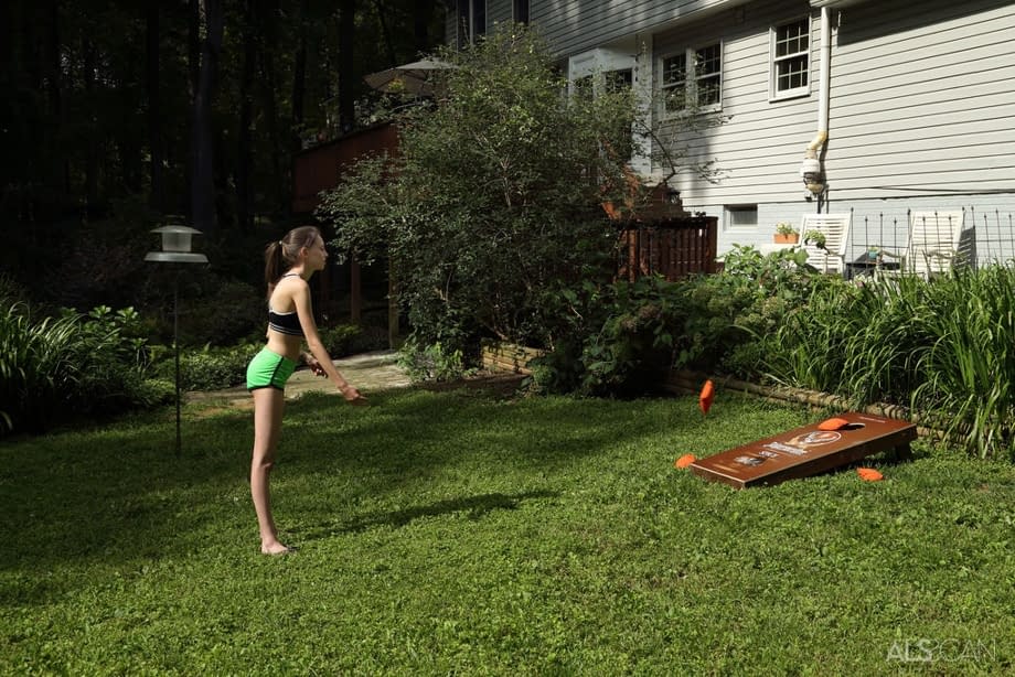 Slender brunette teen Aria Haze dildos her tight pussy atop bean bag toss