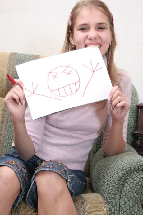 Barely legal teen strips to her socks on a chair during solo action