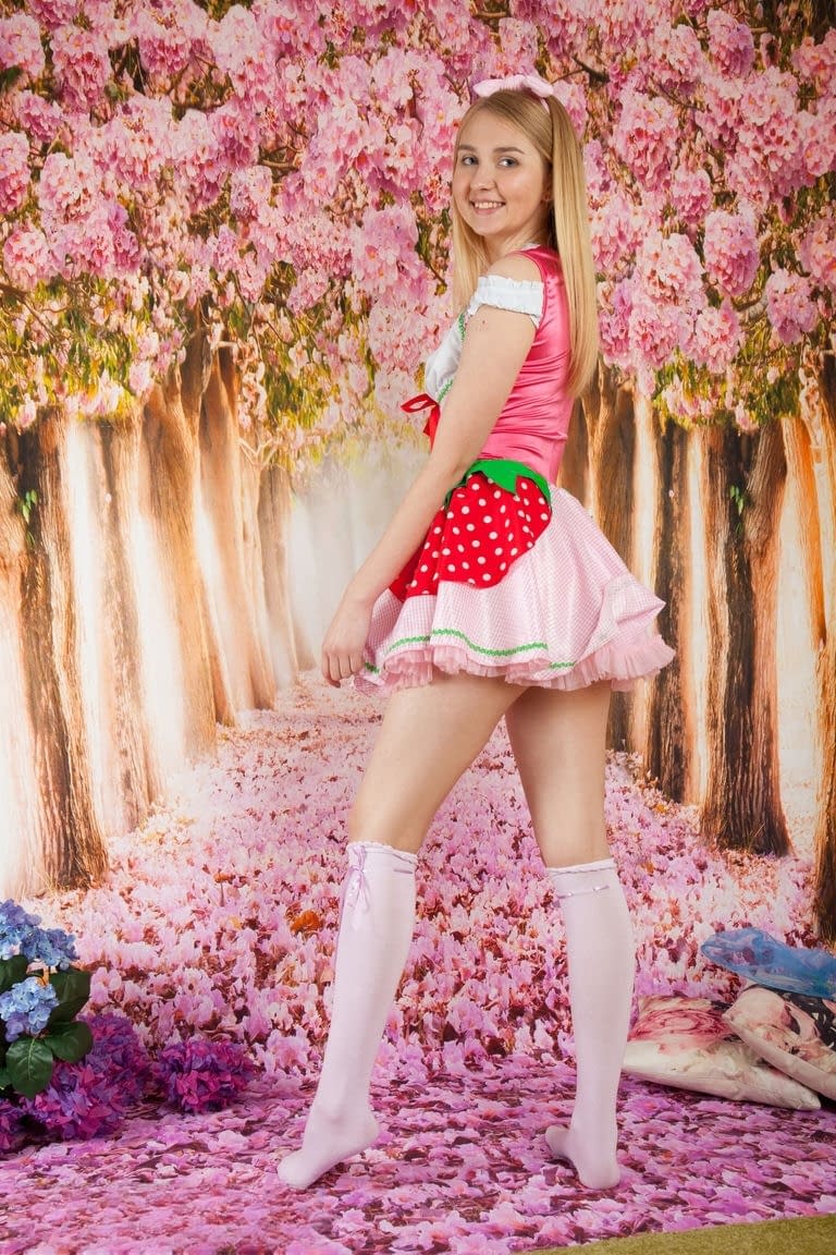Cute teen Nimfa doffs her dress and knee socks before showcasing her bald twat