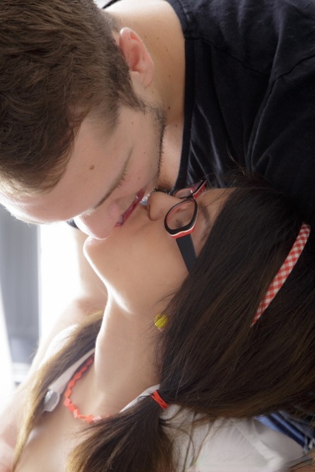 Young brunette nerd Raisa pulls down pantyhose to fuck her boyfriend