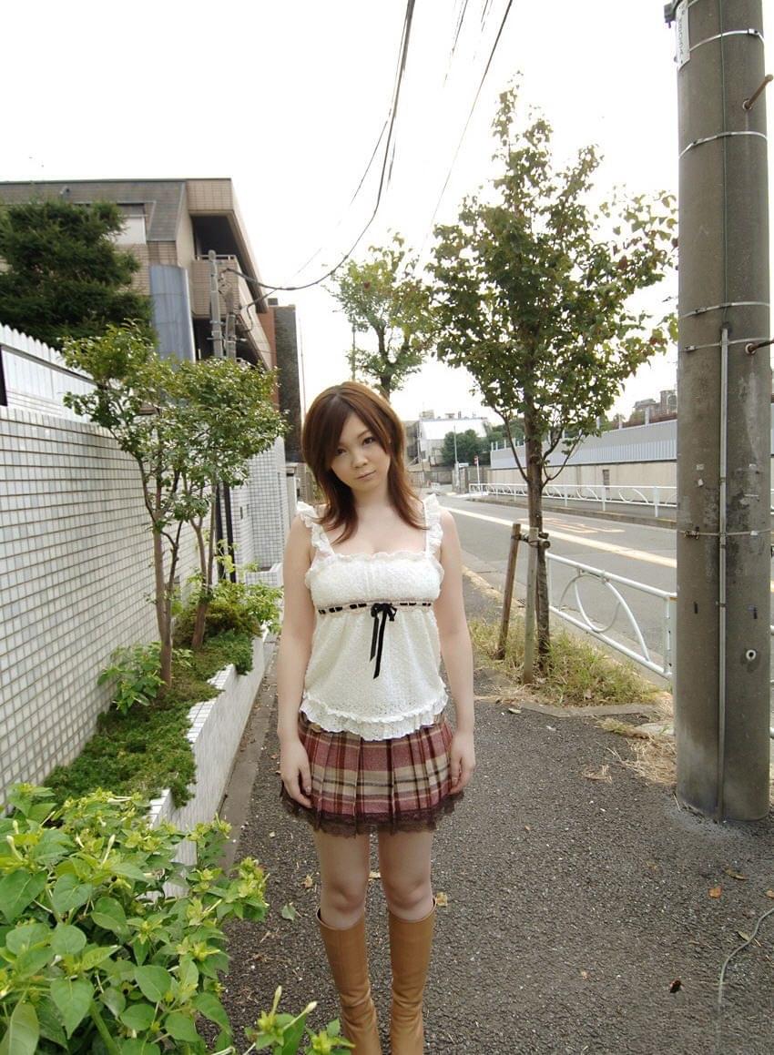 Cute Japanese girl Nami Ogawa flashes upskirt panties outside before disrobing