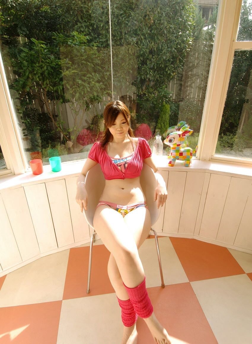 Cute Japanese girl Nami Ogawa flashes upskirt panties outside before disrobing